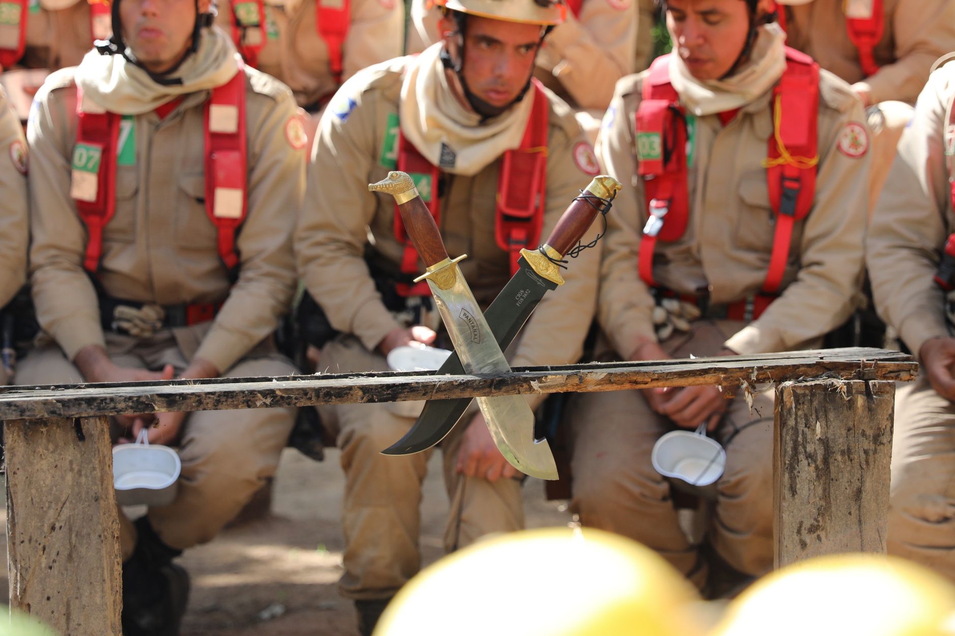 Brazilian firefighters participate in a training exercise with machetes in Mato Grosso, Brazil.