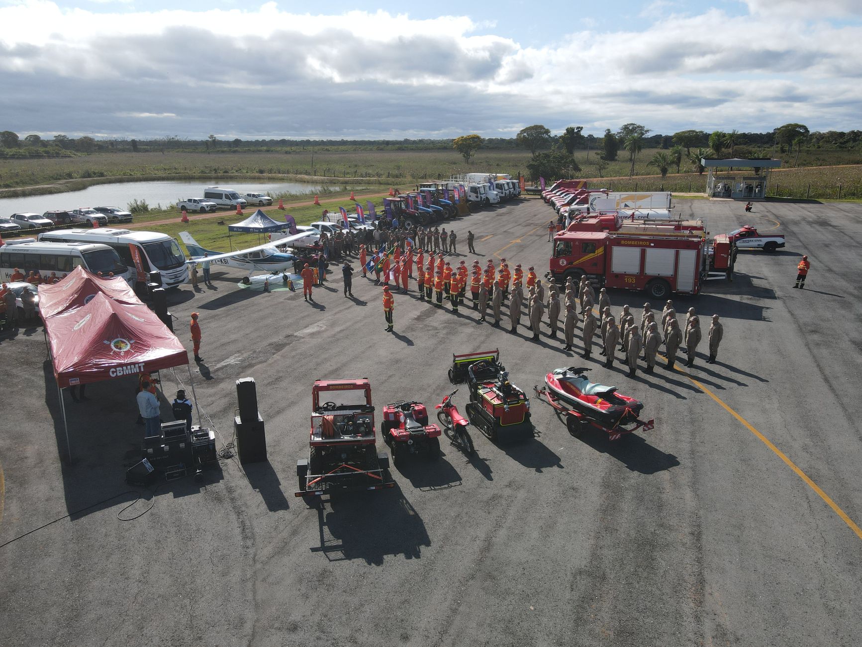 Aerial view capturing a firefighter training event with personnel and equipment.