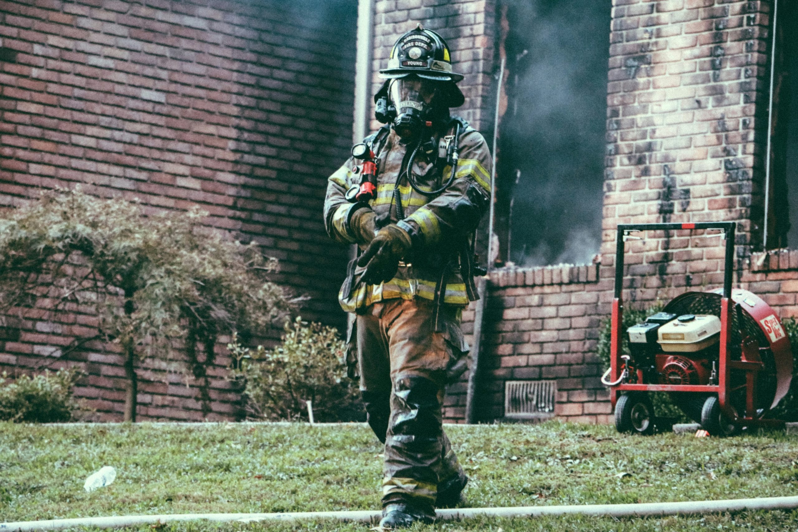 unsplash-s76s64umxpo fireman holding his hand